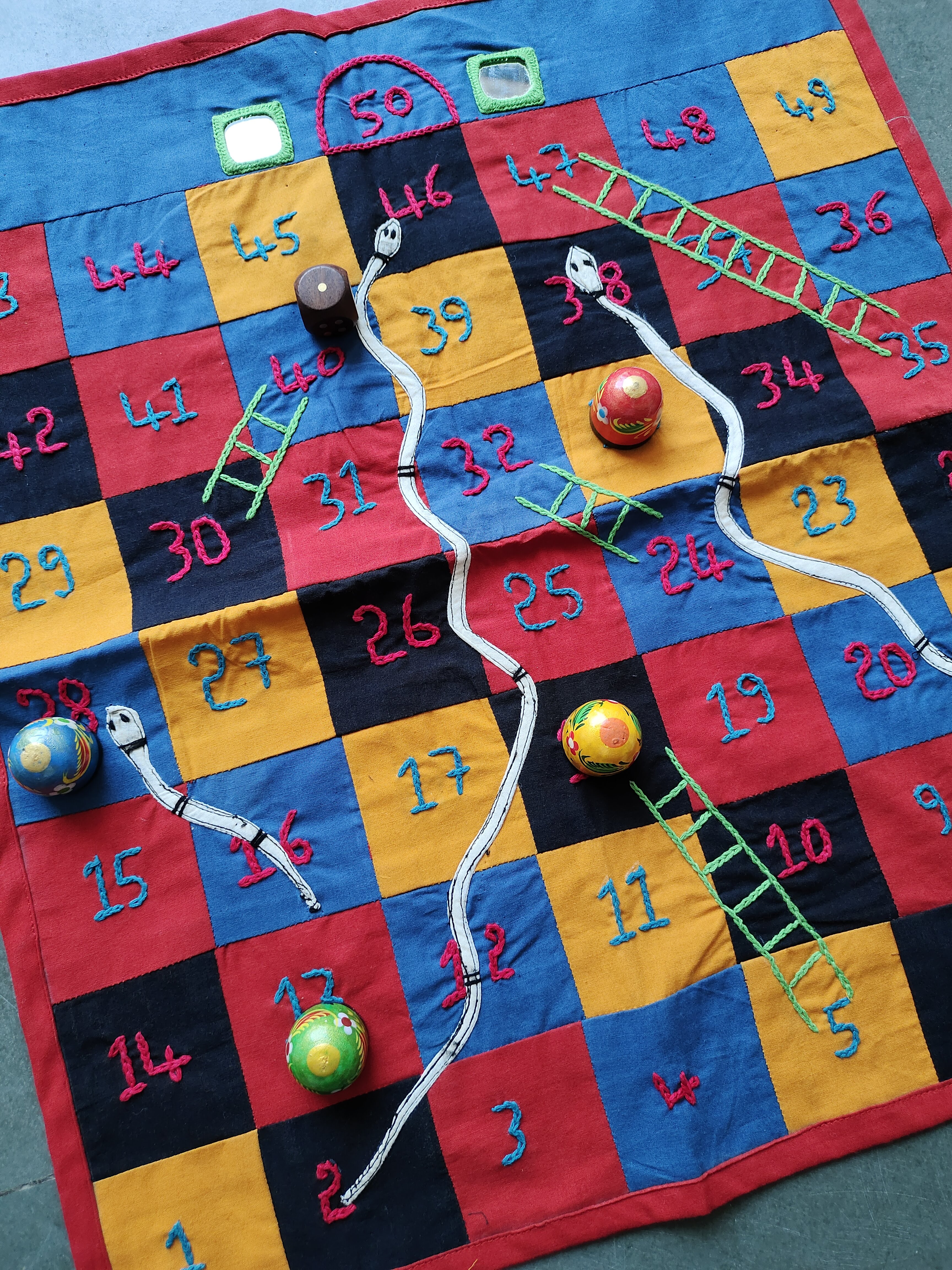 Embroidered snakes & ladders game: 50 squares